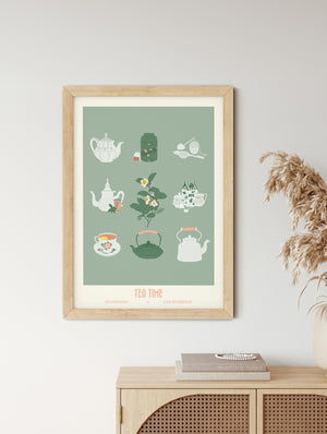 Affiche "Tea Time – Les Iconiques" encadrée dans un cadre bois clair, ambiance déco vintage et chaleureuse