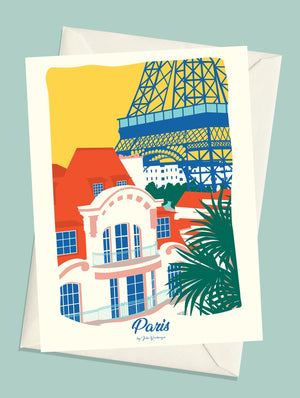 Carte postale illustrée intitulée "Paris, Les Toits" par Julie Roubergue, représentant une vue sur les toits de la capitale et sur la Tour Eiffel dans les tons vifs.